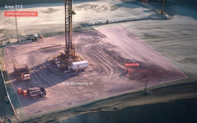 AI-powered security camera monitoring of construction site detecting intrusion and human presence.