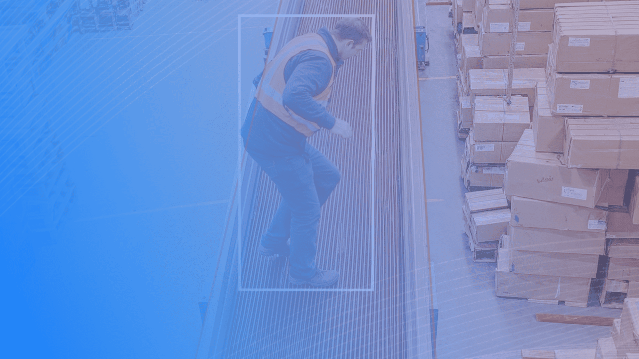 Worker inspecting warehouse shelving using AI-powered analytics, ensuring safety and efficiency.